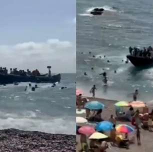 Embarcação chega com dezenas de imigrantes e surpreende banhistas em praia na Espanha