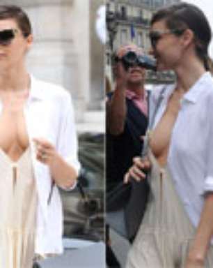 Miranda Kerr quase mostra demais com vestido decotado em Paris