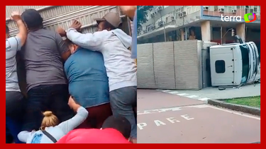 Pedestres se unem e erguem caminhão que tombou para salvar jovem no RJ