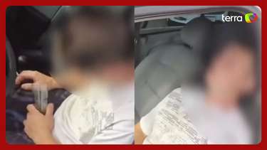 Motorista é flagrado dormindo com carro ligado em Florianópolis (SC)