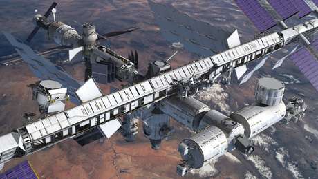 Concepção artística mostra o espectrômetro magnético instalado na Estação Espacial Internacional <p>Concepção artística mostra o espectrômetro magnético instalado na Estação Espacial Internacional</p>