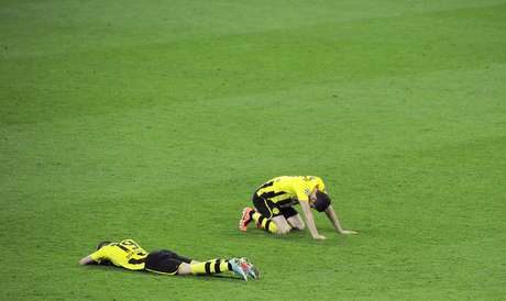 A tristeza pela derrota abate os jogadores do Dortmund A tristeza pela derrota abate os jogadores do Dortmund