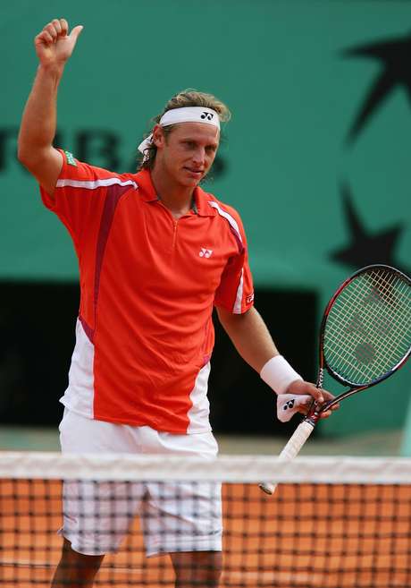 Nalbandian salvou três set points na quarta parcial e eliminou Guga em 2004 Nalbandian salvou três set points na quarta parcial e eliminou Guga em 2004