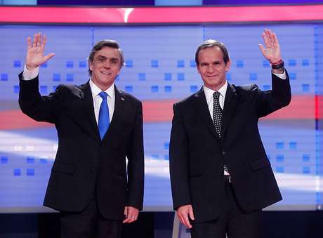 Agencia uno Pablo Longueira y Andrés Allamand antes del debate en Cabal 13.