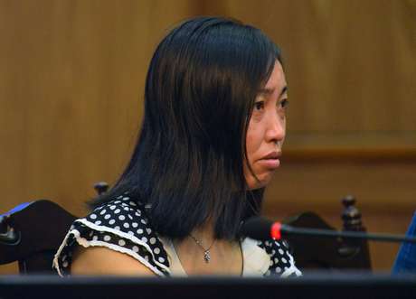 Tang Hui durante o julgamento em Changsha, na província de Hunan, nesta segunda-feira Tang Hui durante o julgamento em Changsha, na província de Hunan, nesta segunda-feira