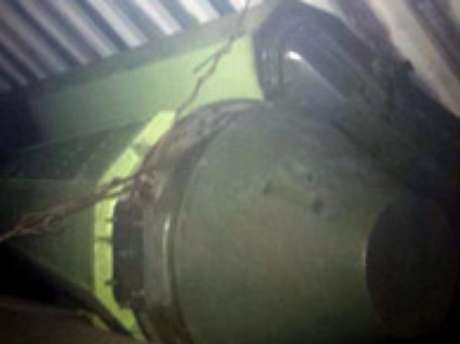 As imagens reproduzidas na televisão local mostraram parte das armas achadas, uns artefatos grandes e alongados de cor verde, arrematados com uma ponta cônica, que estavam ocultos sob as lonas As imagens reproduzidas na televisão local mostraram parte das armas achadas, uns artefatos grandes e alongados de cor verde, arrematados com uma ponta cônica, que estavam ocultos sob as lonas