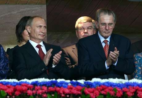 Vladimir Putin e Jacques Rogge acompanharam a abertura do Mundial de Atletismo de Moscou lado a lado Vladimir Putin e Jacques Rogge acompanharam a abertura do Mundial de Atletismo de Moscou lado a lado