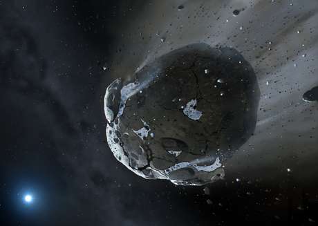 Impressão artística mostra asteroide rico em pedras e água sendo despedaçado pela forte gravidade da estrela anã branca GD 61: essa é a primeira vez que água é encontrada além do Sistema Solar <p>Impressão artística mostra asteroide rico em pedras e água sendo despedaçado pela forte gravidade da estrela anã branca GD 61: essa é a primeira vez que água é encontrada além do Sistema Solar</p>