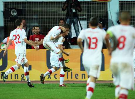 Suíça comemora gol de Michael Lang Suíça comemora gol de Michael Lang