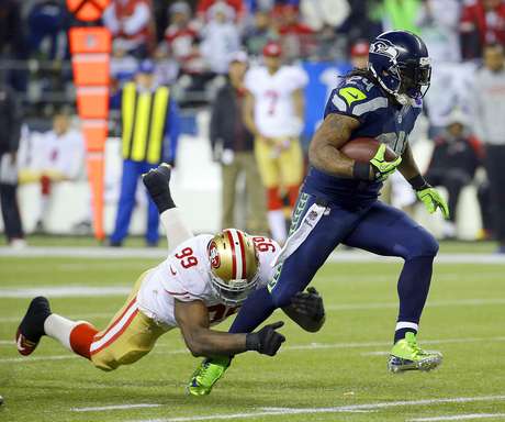 Marcio Jose Sanchez / AP Marshawn Lynch, de los Seahawks de Seattle, se escapa para anotar durante la segunda mitad de la final de la Conferencia Nacioinal, que su equipo ganó frente a los 49ers de San Francisco, el domingo 19 de enero de 2014