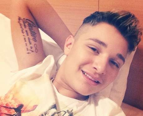 <p>MC Gui homenageou o irm&atilde;o morto com uma tatuagem no bra&ccedil;o</p>