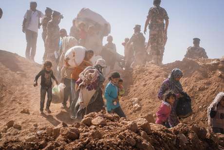 Refugiados sírios são vistos na Jordânia após fugirem de seu país por conflitos Refugiados sírios são vistos na Jordânia após fugirem de seu país por conflitos