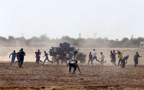 Os conflitos na cidade de Kobani acontecem entre os curdos e os jihadistas, que já tomaram parte do território Os conflitos na cidade de Kobani acontecem entre os curdos e os jihadistas, que já tomaram parte do território