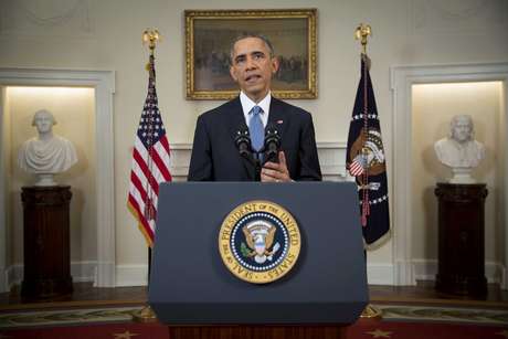 Barack Obama anuncia uma mudança na política em relação a Cuba, em um discurso à nação, a partir da Sala do Gabinete da Casa Branca, em Washington, em 17 de dezembro Barack Obama anuncia uma mudança na política em relação a Cuba, em um discurso à nação, a partir da Sala do Gabinete da Casa Branca, em Washington, em 17 de dezembro