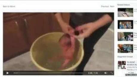 Clipe tem imagens de baixa qualidade em que rosto de quem segura bebê não aparece Clipe tem imagens de baixa qualidade em que rosto de quem segura bebê não aparece