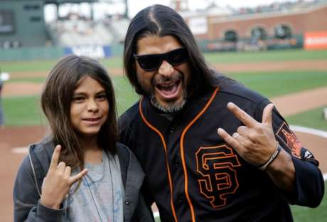 Difusión Robert Trujillo y su hijo Ty, de 12 años.