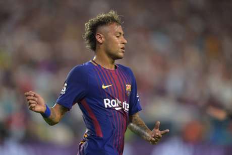 Neymar chegou ao Barcelona em 2013 (Foto: HECTOR RETAMAL / AFP)