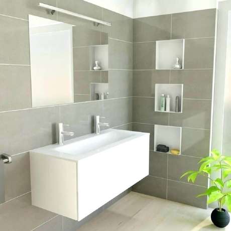 2. Decoração clean de banheiro com nicho embutido