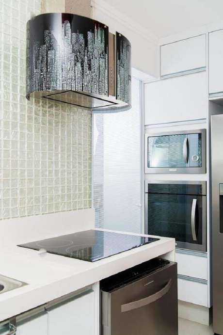 39. Alguns modelos de coifas podem ser o grande destaque na decoração da cozinha 39. Alguns modelos de coifas podem ser o grande destaque na decoração da cozinha
