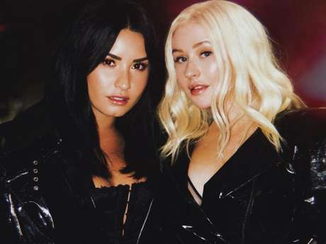 Demi Lovato e Christina Aguilera lançam a parceria "Fall In Line" Demi Lovato e Christina Aguilera lançam a parceria "Fall In Line"