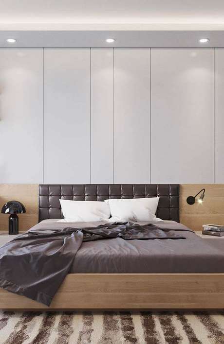 6. Decoração para quarto de casal com cabeceira estofada de couro 6. Decoração para quarto de casal com cabeceira estofada de couro