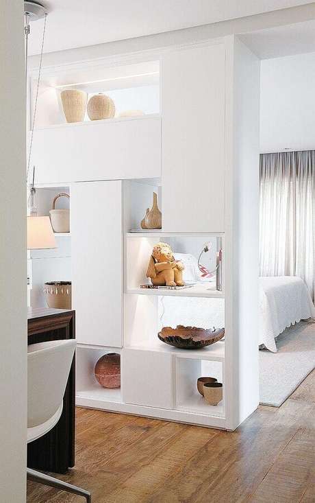 32. Estante de gesso também servem como divisórias de ambientes 32. Estante de gesso também servem como divisórias de ambientes