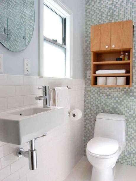 30. Em um banheiro clean, o nicho de madeira pode trazer bastante conforto 30. Em um banheiro clean, o nicho de madeira pode trazer bastante conforto