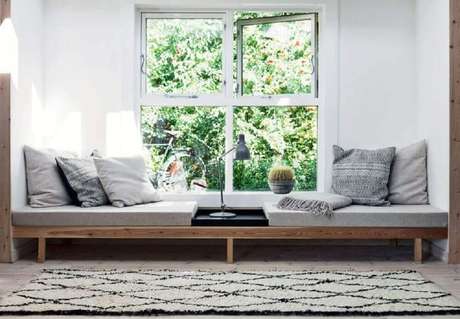15. Cantinho da leitura com decoração minimalista – Foto: Boligmagasi