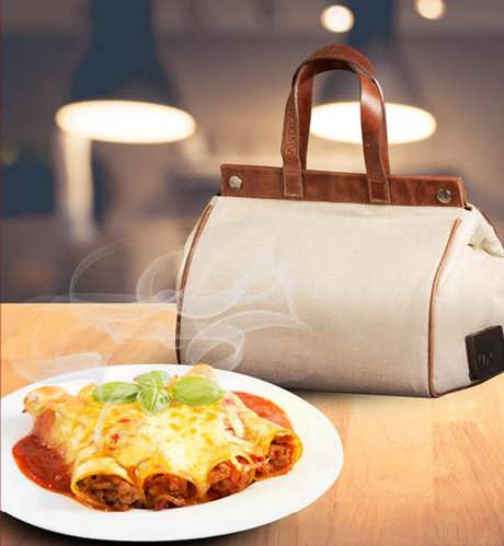 A Voilà Bag é uma bolsa que funciona como um forninho elétrico, transporta sua refeição e a aquece onde você estiver A Voilà Bag é uma bolsa que funciona como um forninho elétrico, transporta sua refeição e a aquece onde você estiver