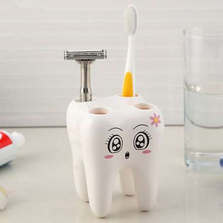 27. O porta-escovas de dente dá um lugar certo para ela e também pode ser usado para guardar outros objetos. Foto de Amazon 27. O porta-escovas de dente dá um lugar certo para ela e também pode ser usado para guardar outros objetos. Foto de Amazon