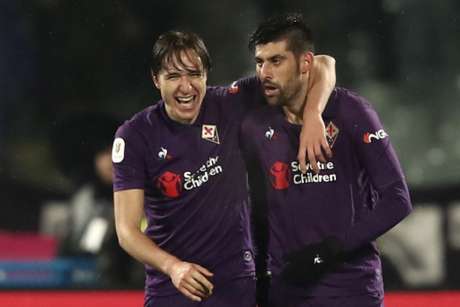 Benassi e Chieva comemoram um dos gols do massacre da Fiorentina (Foto: Isabella Bonotto / AFP) Benassi e Chieva comemoram um dos gols do massacre da Fiorentina (Foto: Isabella Bonotto / AFP)