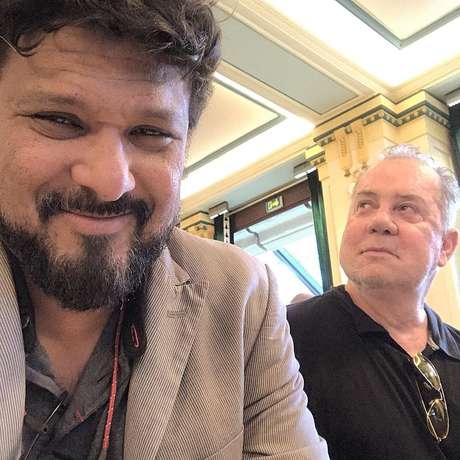 Luiz Fernando Guimarães (ao fundo) com Adriano Medeiros: parceria de muitos anos no amor e nos negócios Luiz Fernando Guimarães (ao fundo) com Adriano Medeiros: parceria de muitos anos no amor e nos negócios