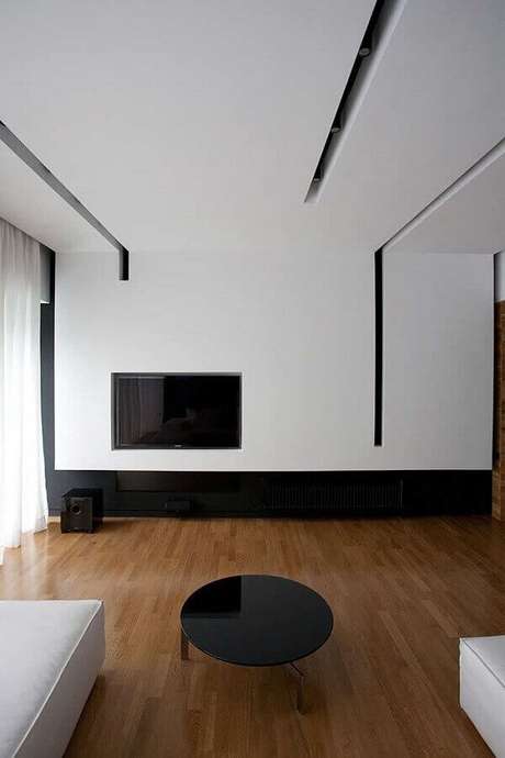 30. No ambiente contemporâneo a moldura de gesso acartonado tem os rasgos que se prolongam até a parede de Drywall. Fonte: Pinterest 30. No ambiente contemporâneo a moldura de gesso acartonado tem os rasgos que se prolongam até a parede de Drywall. Fonte: Pinterest