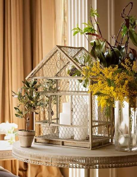 62. Invista na decoração com gaiola de passarinho. Fonte: Pinterest 62. Invista na decoração com gaiola de passarinho. Fonte: Pinterest