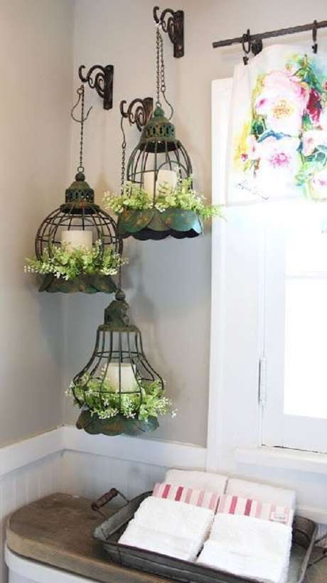 63. Arranjo formado com gaiolas decorativas. Fonte: Pinterest 63. Arranjo formado com gaiolas decorativas. Fonte: Pinterest