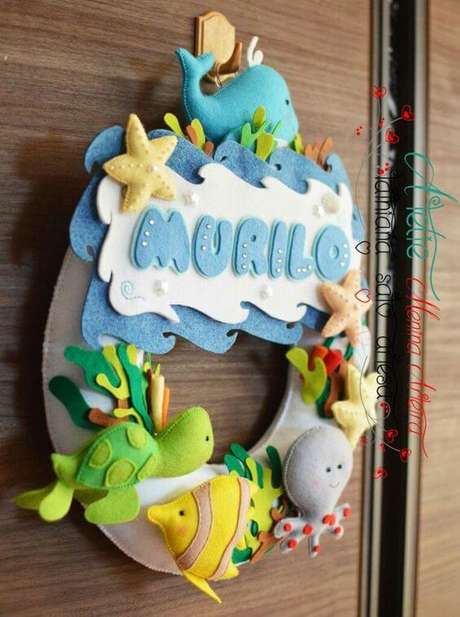 40. Guirlanda de feltro para bebê com animais – Por: Pinterest 40. Guirlanda de feltro para bebê com animais – Por: Pinterest