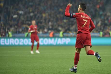 Cristiano Ronaldo é o maior artilheiro de Portugal, Real Madrid e da Liga dos Campeões (Foto: AFP) Cristiano Ronaldo é o maior artilheiro de Portugal, Real Madrid e da Liga dos Campeões (Foto: AFP)