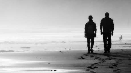 Silhouetted characters on beach Silhouetted characters on beach