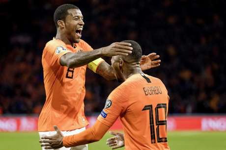Wijnaldum marcou três vezes e foi novamente o destaque da partida (Foto: AFP) Wijnaldum marcou três vezes e foi novamente o destaque da partida (Foto: AFP)