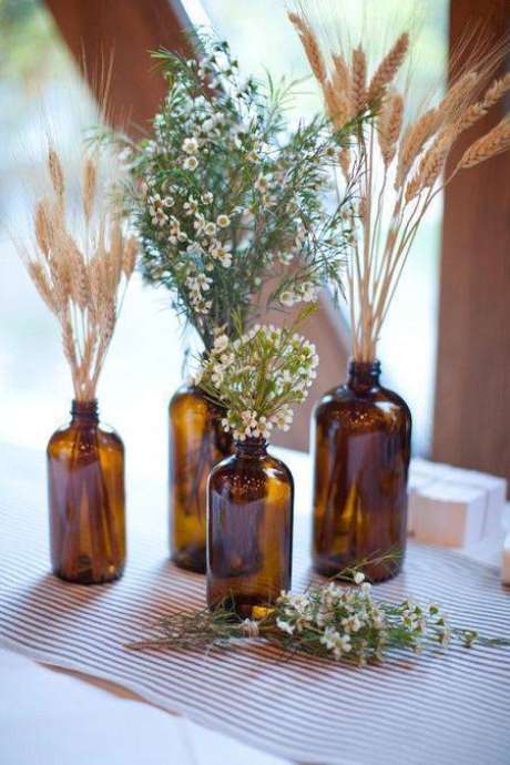 37. As flores secas podem mudar a decoração. Foto: DueHome 37. As flores secas podem mudar a decoração. Foto: DueHome