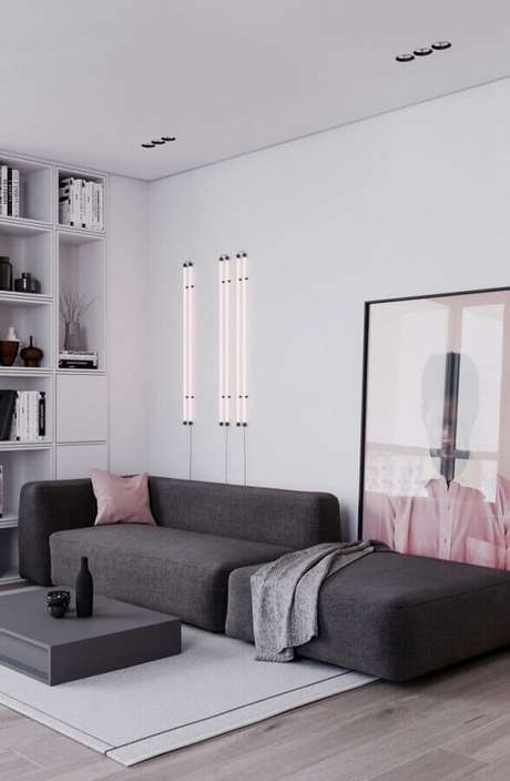 57. Sala de estar moderna decorada com sofá cinza modulado e quadro grande – Foto: Behance 57. Sala de estar moderna decorada com sofá cinza modulado e quadro grande – Foto: Behance