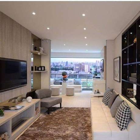 30. Rack com painel para TV para sala com varanda integrada – Foto: Pinterest 30. Rack com painel para TV para sala com varanda integrada – Foto: Pinterest