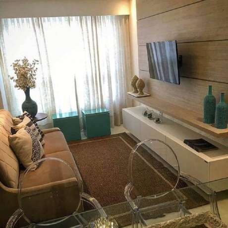 43. Rack com painel suspenso para sala pequena decorada em tons neutros – Foto: XD Ambientes 43. Rack com painel suspenso para sala pequena decorada em tons neutros – Foto: XD Ambientes
