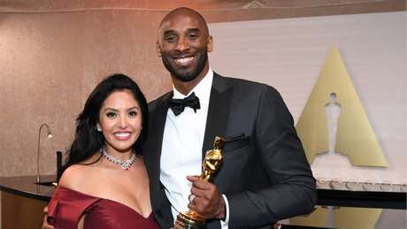 Koe e a esposa Vanessa, na cerimônia do Oscar (Foto: ANGELA WEISS / AFP) Koe e a esposa Vanessa, na cerimônia do Oscar (Foto: ANGELA WEISS / AFP)