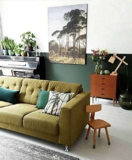 62. Decoração simples para sala com parede verde – Foto: Blog Thony