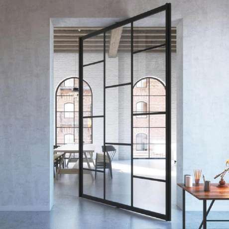 22. Modelo de porta de ferro com vidro pivotante – Foto: Pinterest 22. Modelo de porta de ferro com vidro pivotante – Foto: Pinterest
