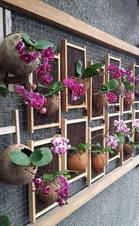 45. Floreira com orquídeas na parede – Via: Andro 45. Floreira com orquídeas na parede – Via: Andro