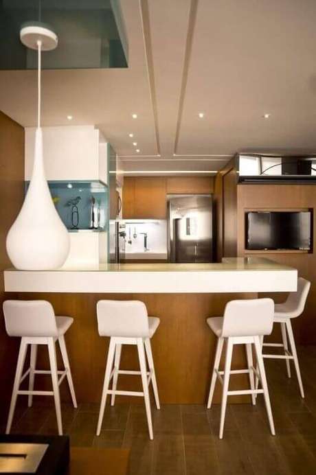 14. Escolha banquetas de cozinha que proporcionem conforto e beleza ao ambiente 14. Escolha banquetas de cozinha que proporcionem conforto e beleza ao ambiente