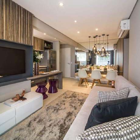 27. Decoração de apartamento pequeno com sala de jantar e estar integradas – Foto: Assetproject 27. Decoração de apartamento pequeno com sala de jantar e estar integradas – Foto: Assetproject