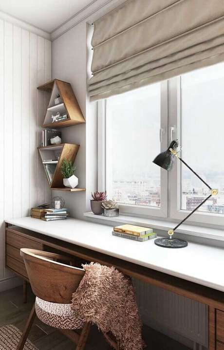 58. Nichos em formato de triângulo para decoração de cantinho de estudo – Foto: Futurist Architecture 58. Nichos em formato de triângulo para decoração de cantinho de estudo – Foto: Futurist Architecture
